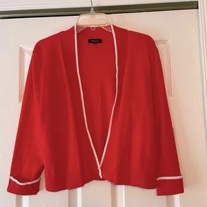 Bright red cropped cardigan.